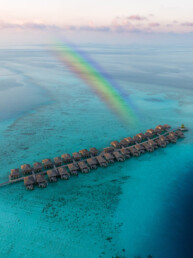 Drone view of overwater villas in the Maldives