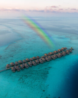 Drone view of overwater villas in the Maldives