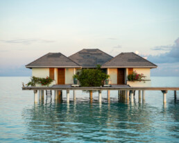 Overwater villas in the Maldives with crystal-clear water