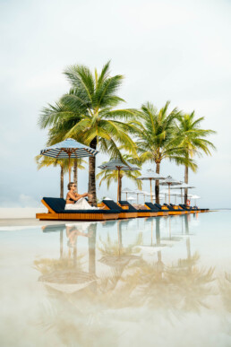 Model relaxing by private pool in Maldives